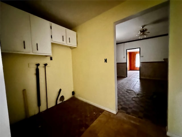 laundry area featuring hookup for a washing machine and cabinets