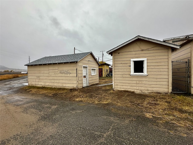 exterior space with an outbuilding