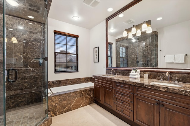 89 Slopeside Dr Unit 4, Whitefish, MT 59937 - bathroom with a bath, double vanity, and a stall shower