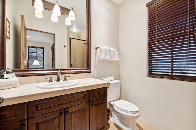 89 Slopeside Dr Unit 4, Whitefish, MT 59937 - full bath with vanity, toilet, tiled shower, and plenty of natural light