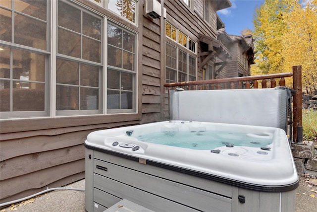 89 Slopeside Dr Unit 4, Whitefish, MT 59937 - view of patio / terrace with a hot tub