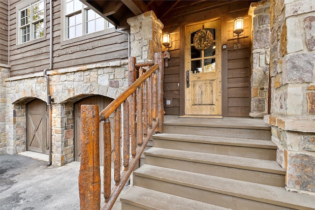 89 Slopeside Dr Unit 4, Whitefish, MT 59937 - property entrance featuring stone siding