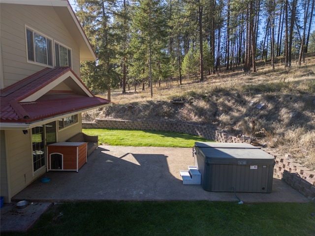 view of patio featuring a hot tub