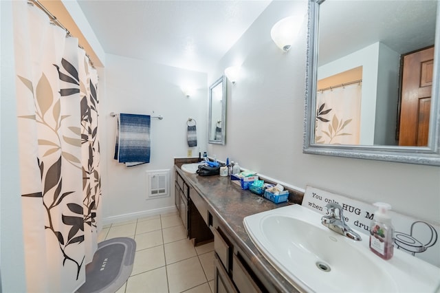 bathroom featuring vanity and tile patterned floors