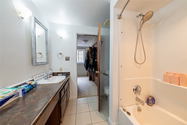 full bathroom featuring a textured ceiling, toilet, shower / bath combination, tile patterned floors, and vanity