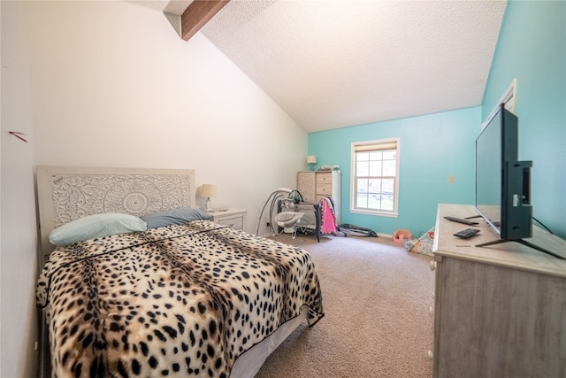 carpeted bedroom featuring lofted ceiling with beams and a textured ceiling