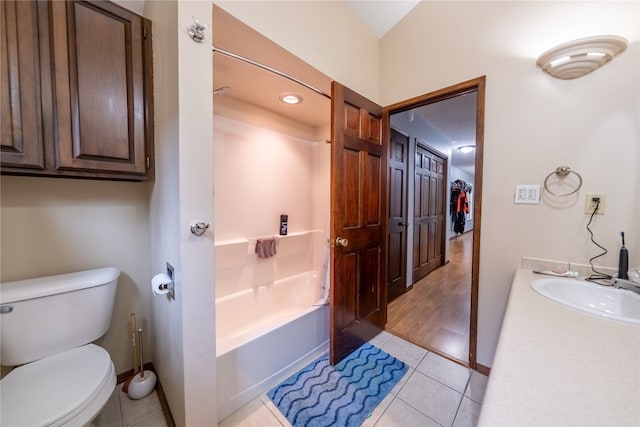 full bathroom with vanity, tile patterned floors, bathing tub / shower combination, and toilet