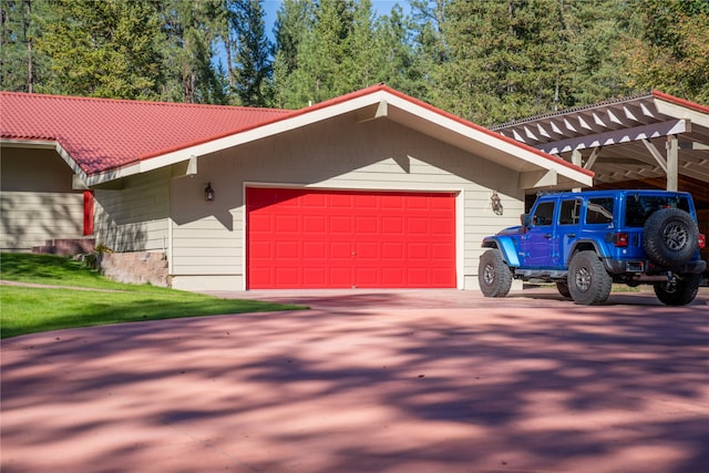 garage with a yard