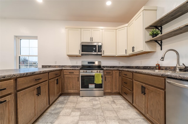 kitchen featuring appliances with stainless steel finishes and sink