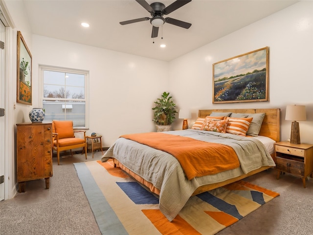 carpeted bedroom featuring ceiling fan