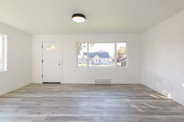 entrance foyer featuring light hardwood / wood-style floors