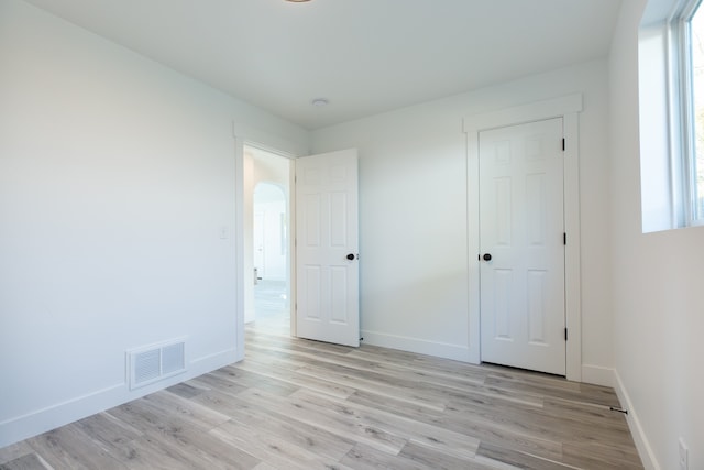 unfurnished bedroom with light hardwood / wood-style floors