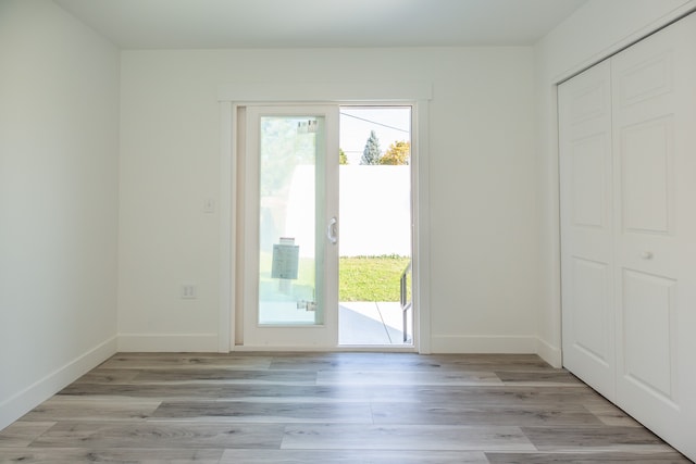 doorway featuring light hardwood / wood-style flooring