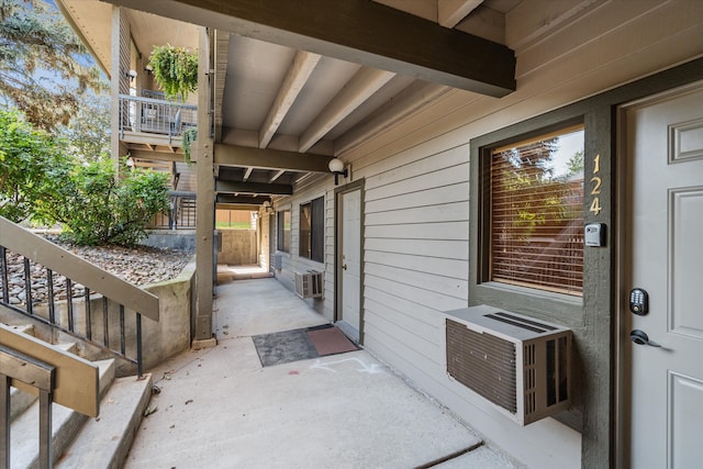 property entrance with a patio