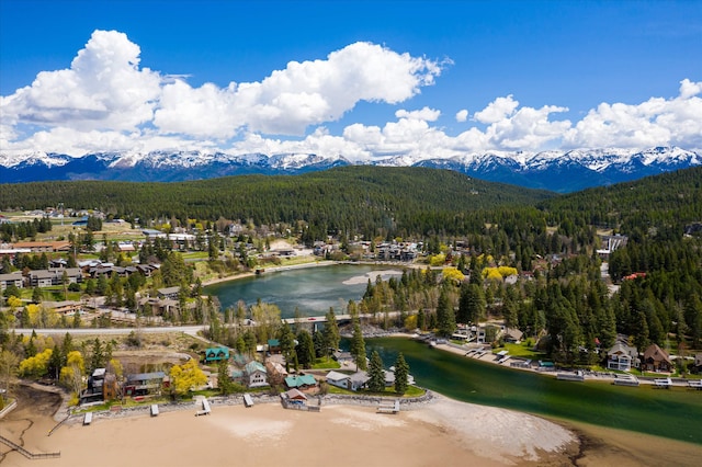 bird's eye view featuring a water and mountain view