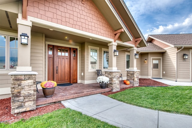 property entrance featuring covered porch