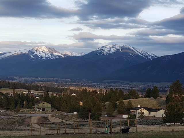 property view of mountains featuring a rural view