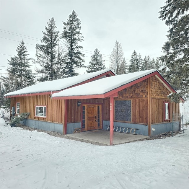 view of snow covered property