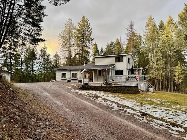 view of front of property with a deck