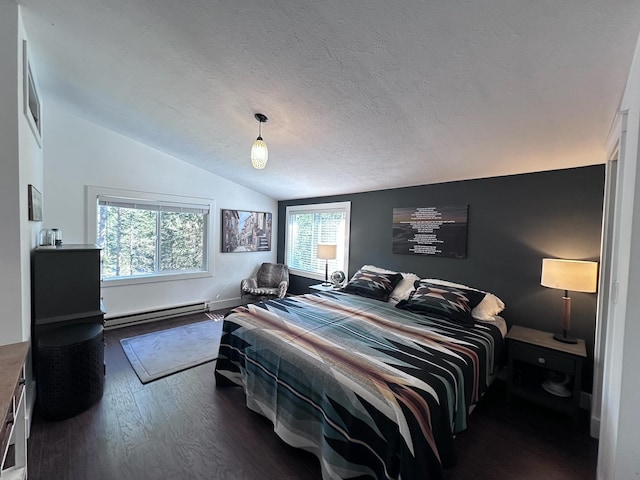 bedroom with multiple windows, dark hardwood / wood-style flooring, vaulted ceiling, and a baseboard heating unit