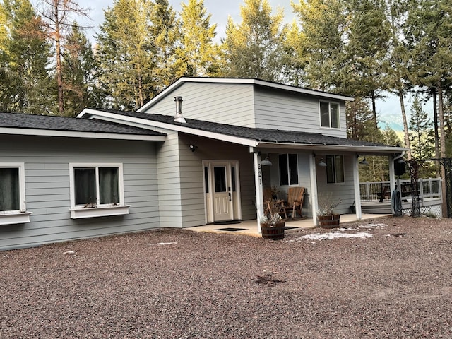 view of front facade with a patio area