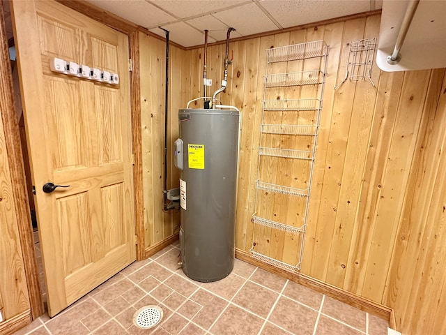 utility room with electric water heater