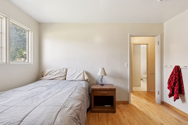 bedroom featuring light wood-type flooring