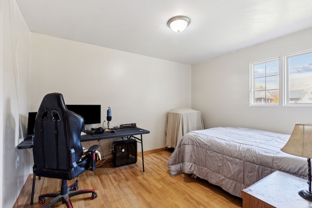 bedroom with light hardwood / wood-style flooring