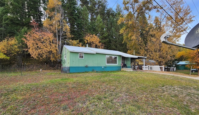 33762 US Highway 2, Libby, MT 59923 - manufactured / mobile home with a front yard and covered porch