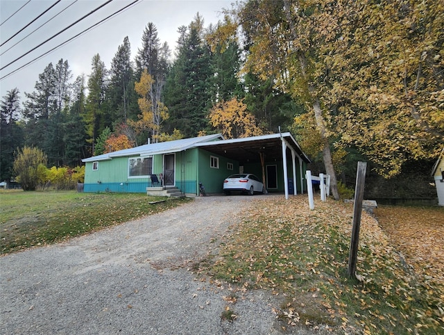 33762 US Highway 2, Libby, MT 59923 - manufactured / mobile home with driveway, a carport, and a front yard