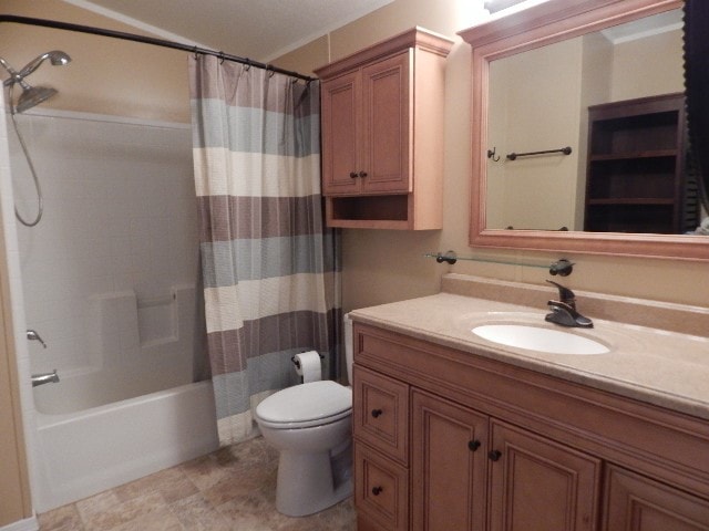 full bathroom with vanity, toilet, and shower / tub combo