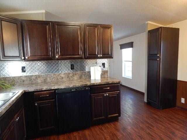 2922 Village Rd, Helena, MT 59602 - kitchen with tasteful backsplash, dark brown cabinets, light stone countertops, dark wood-type flooring, and black appliances