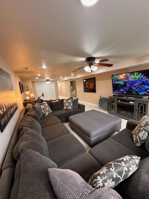 10636 Nez Perce Loop, Lolo, MT 59847 - living room with ceiling fan, carpet flooring, and recessed lighting