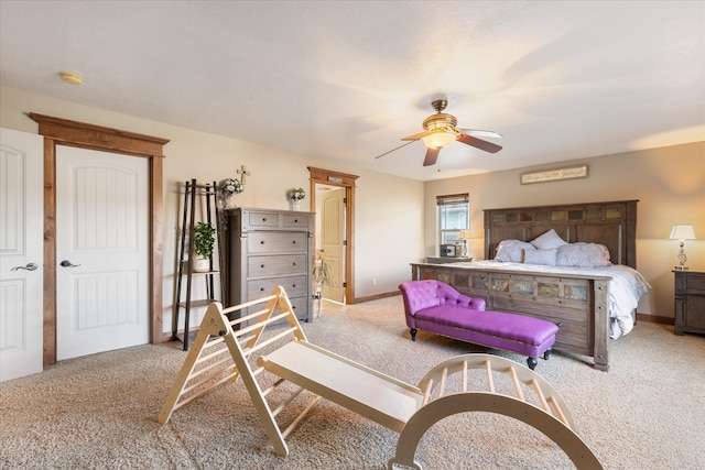 bedroom featuring ceiling fan and light colored carpet