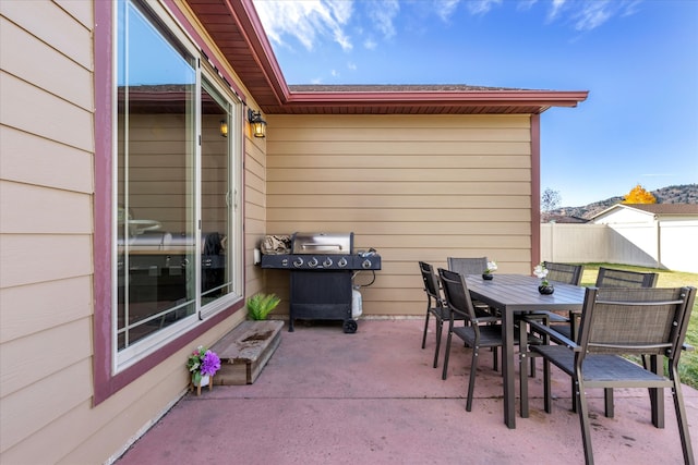 view of patio with a grill