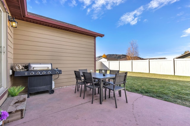 view of patio with a grill