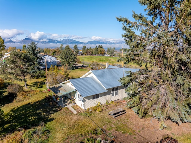 drone / aerial view featuring a mountain view