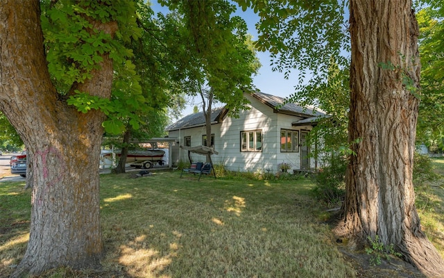 exterior space with a lawn