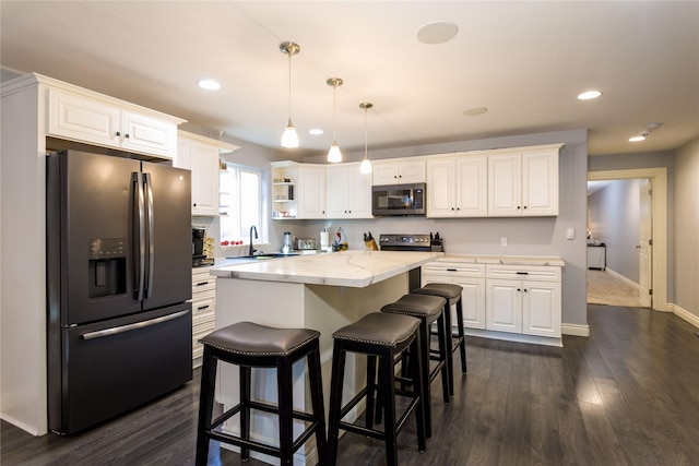 154 Riverside Dr, Kalispell, MT 59901 - kitchen featuring appliances with stainless steel finishes, white cabinetry, open shelves, baseboards, and recessed lighting