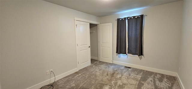 unfurnished bedroom with carpet