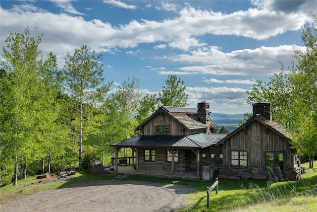 view of front of property featuring covered porch