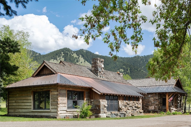 view of front facade featuring a mountain view