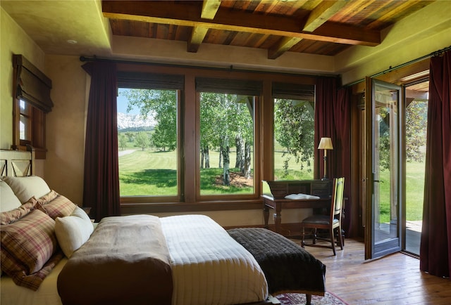 bedroom with multiple windows, access to exterior, wood ceiling, and light wood-type flooring