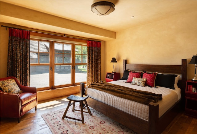 bedroom featuring hardwood / wood-style flooring