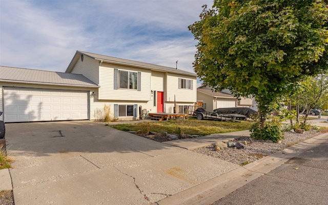 split foyer home featuring a garage