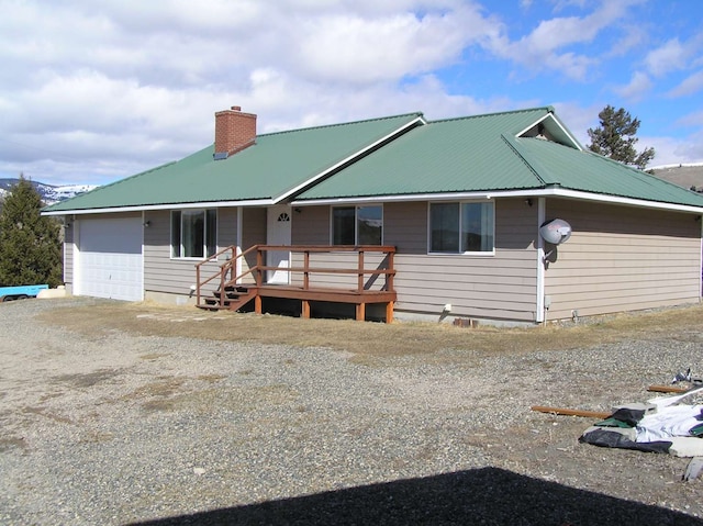 view of front facade with a deck