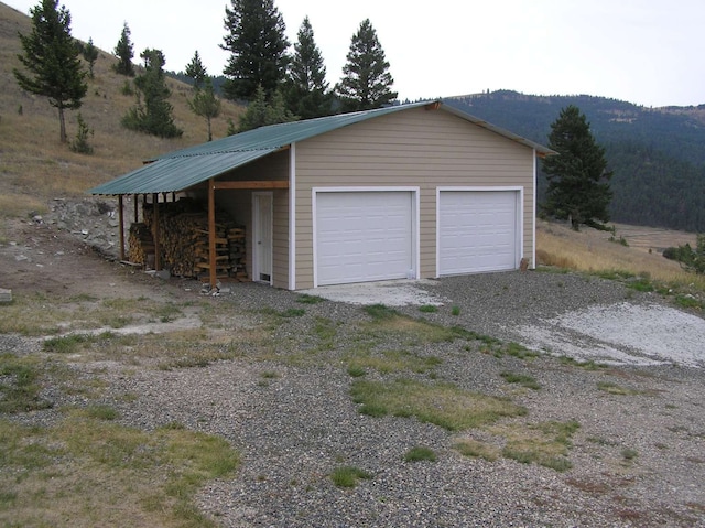 garage featuring a mountain view