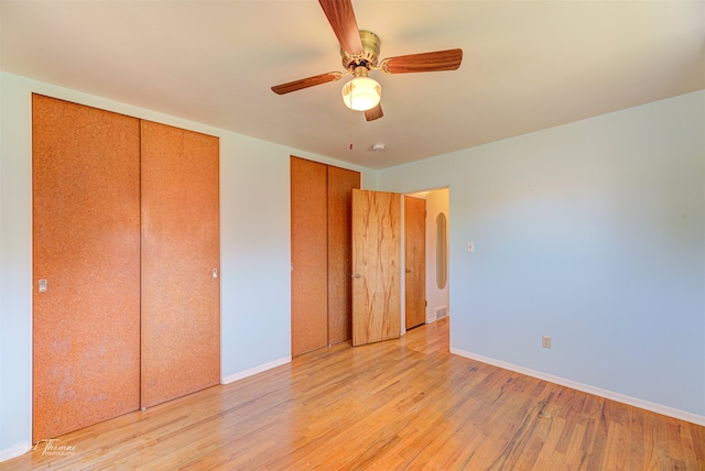 full bathroom with bath / shower combo with glass door, tile patterned flooring, plenty of natural light, and toilet