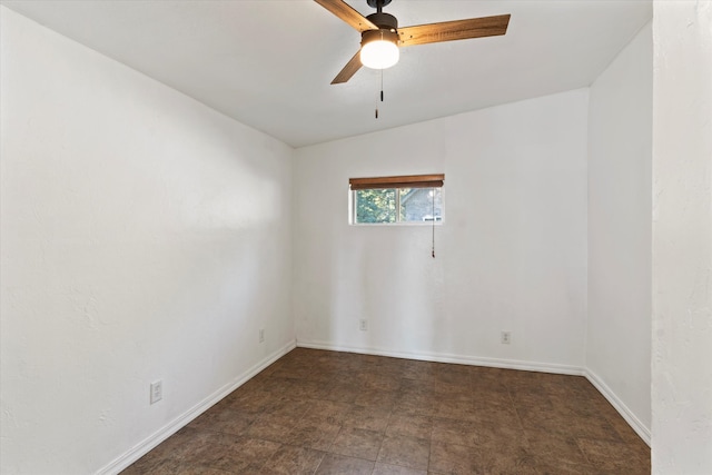 spare room with ceiling fan and lofted ceiling