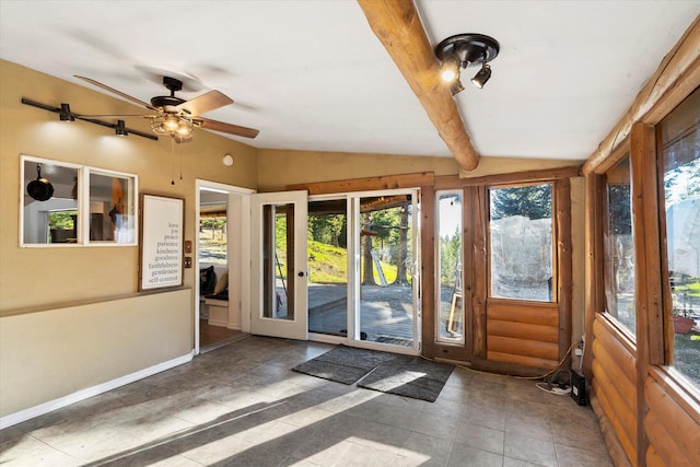 1424 Bierney Creek Rd, Lakeside, MT 59922 - unfurnished sunroom with lofted ceiling and baseboards